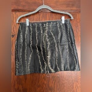 Free People Black Faux Leather Mini Skirt with Zigzag Stitching and two way zip